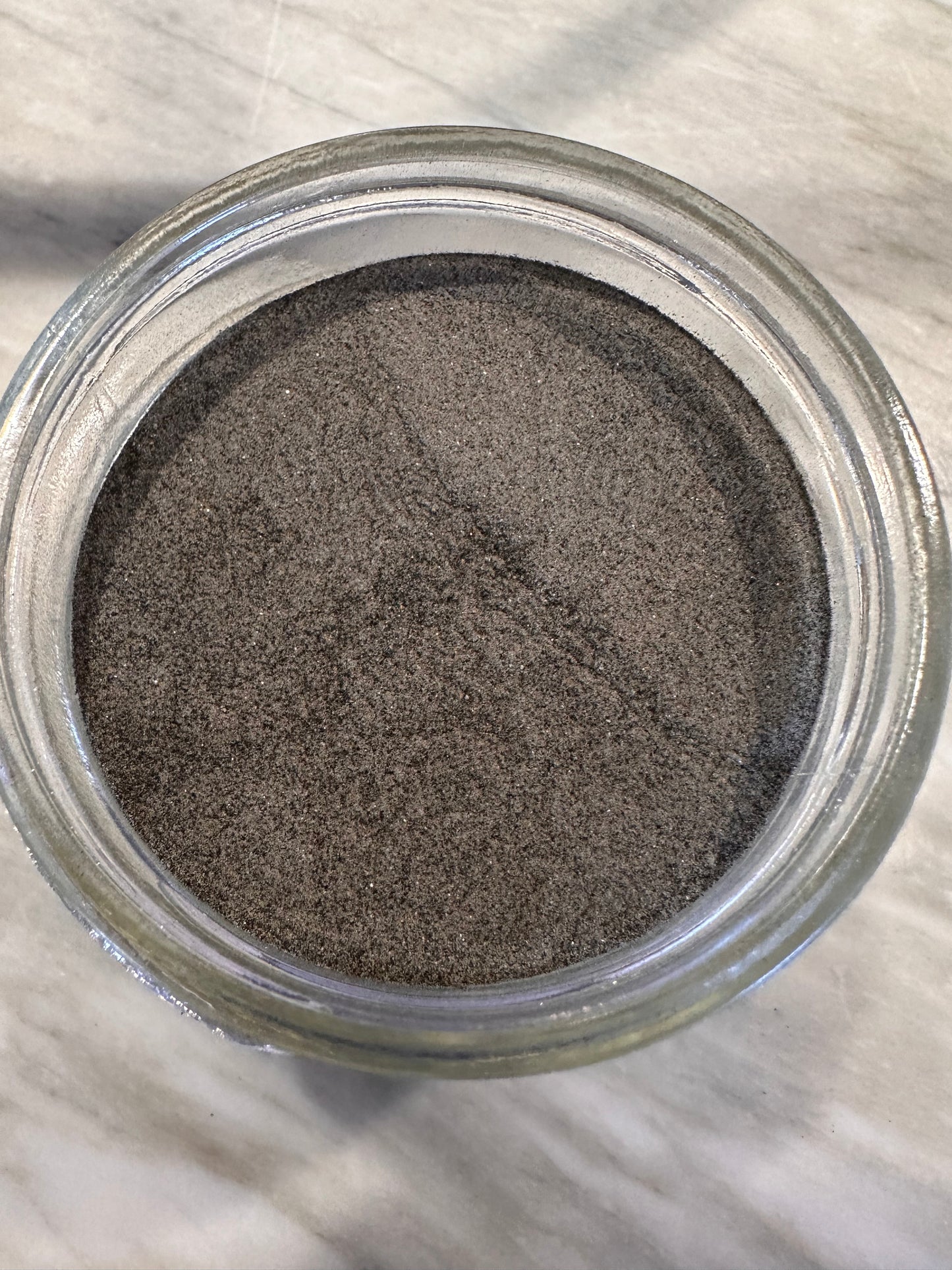 Qweenz’ Activated Charcoal Brushing Powder
